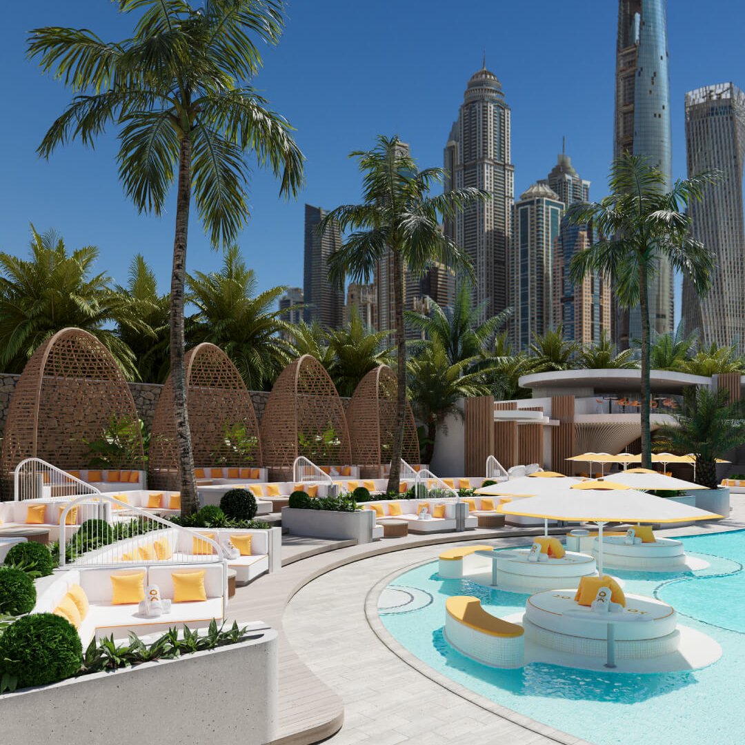 O Beach Dubai Pool Beds with Dubai Marina skyline in the background